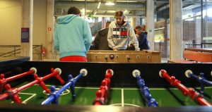 screenshot: Brincadeiras, pebolim, futebol de botão e ping-pong nas férias do Museu do Futebol