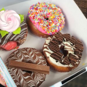 screenshot: Loja com as famosas rosquinhas de Homer Simpson, Mister Donuts, chega à Zona Norte